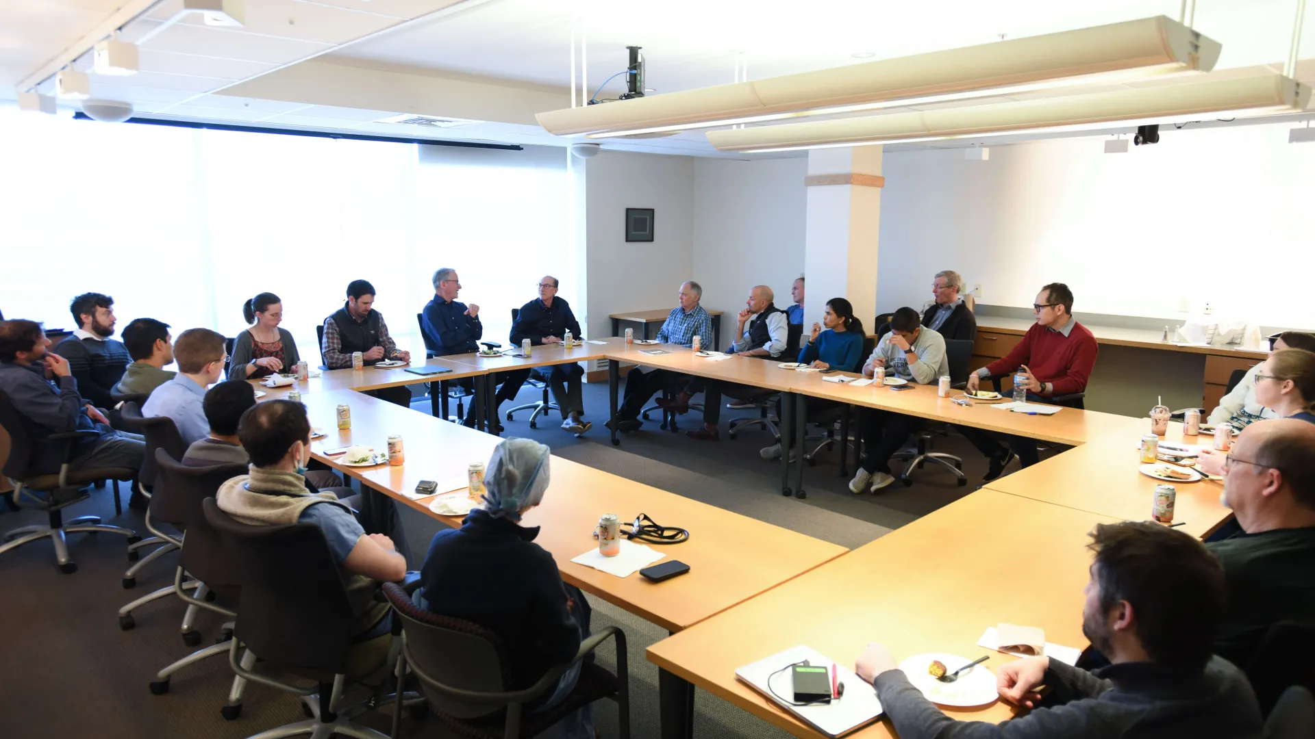 people sitting around a conference table