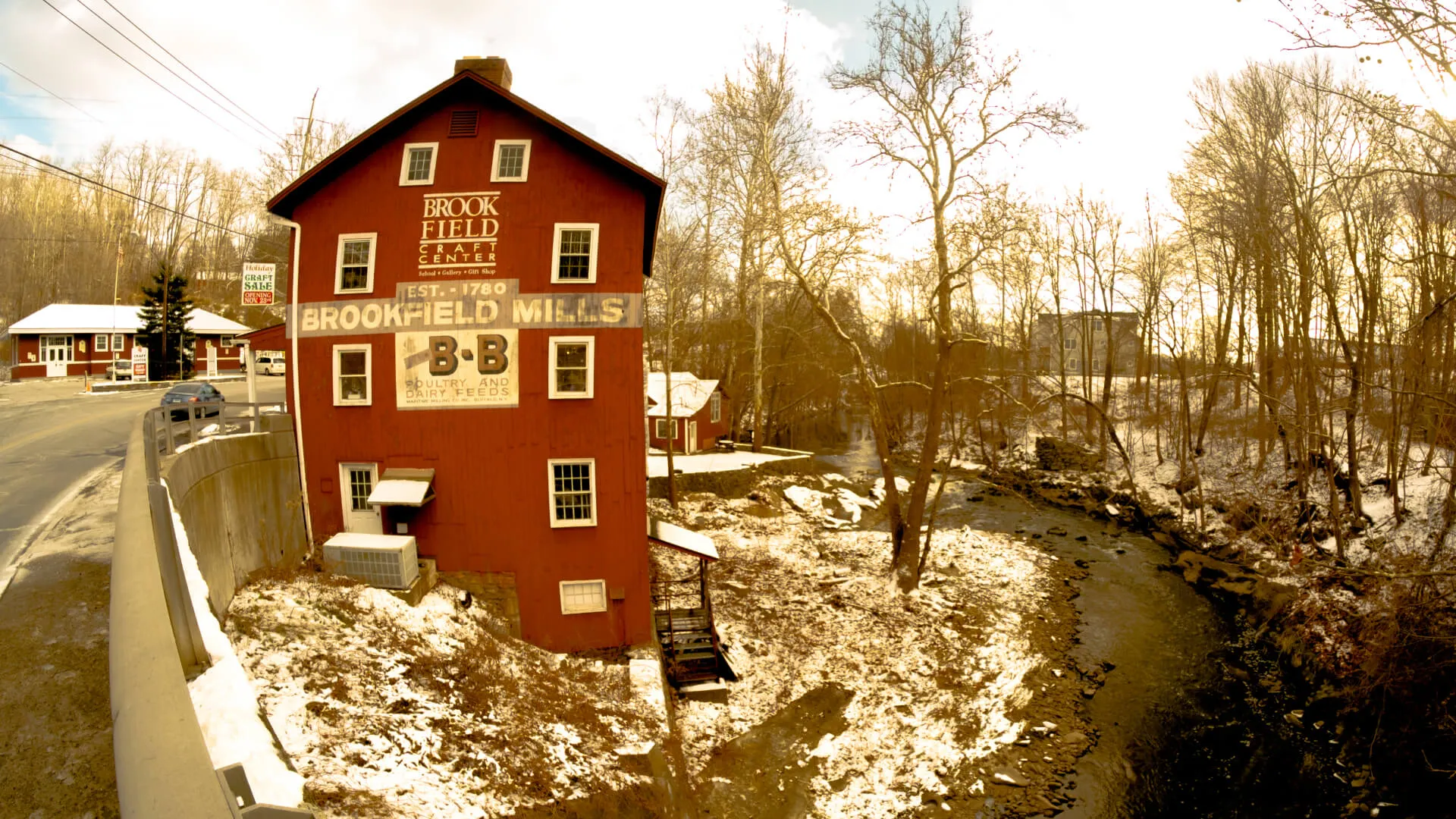 old store building on a riverbank