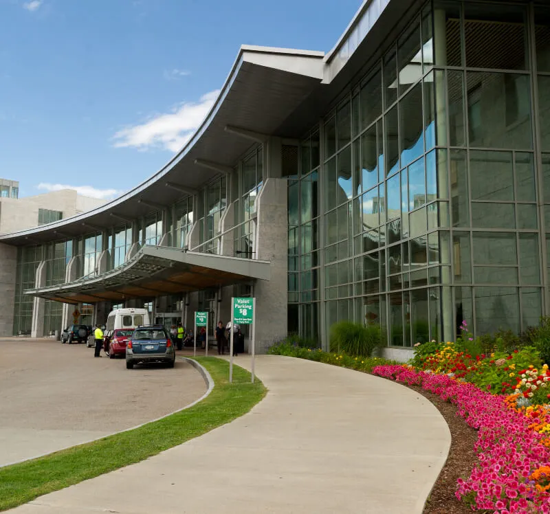 front of building with swooping glass exterior