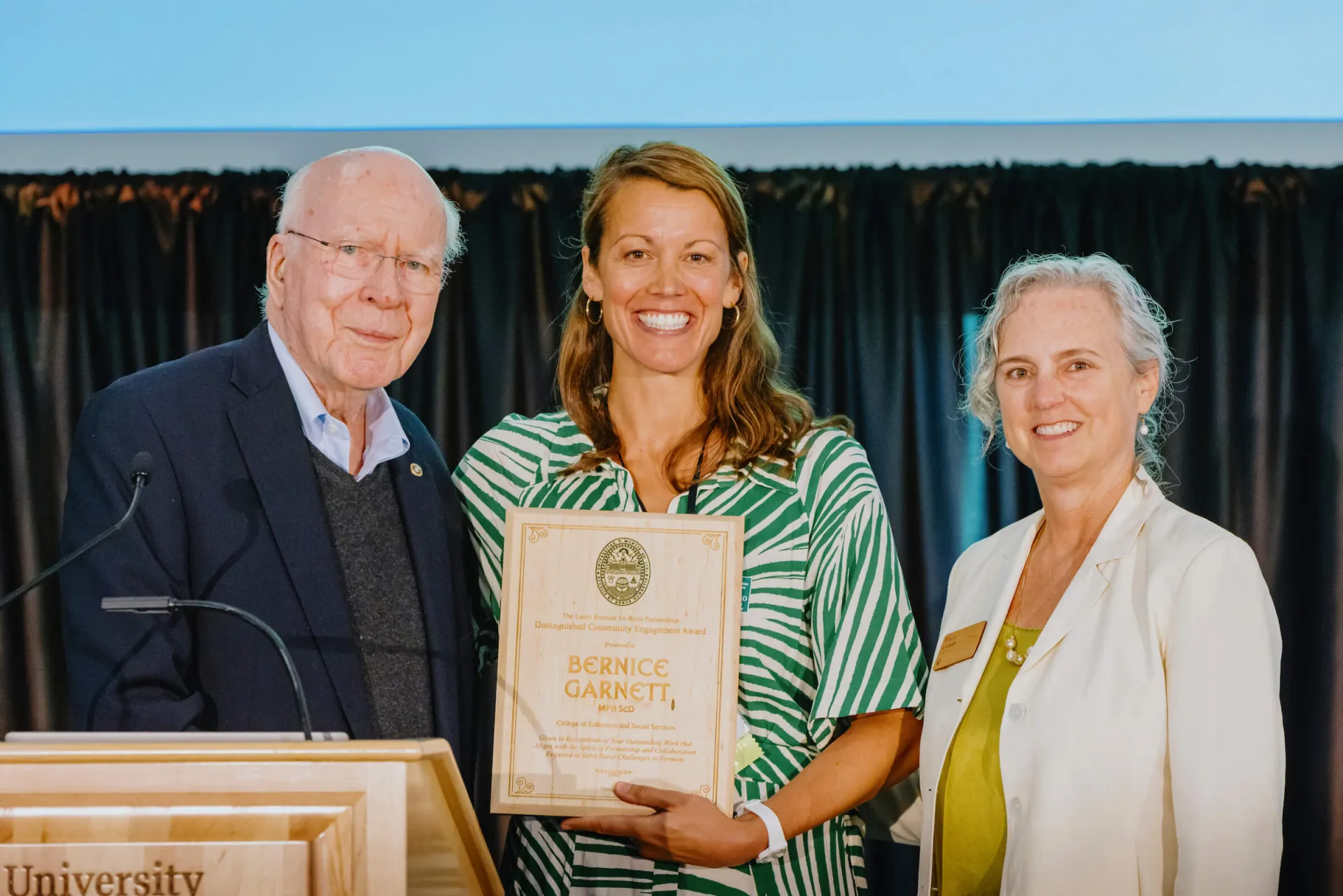 Bernice Garnett receiving the Leahy Institute Partnership Award at the 2025 RISE Summit