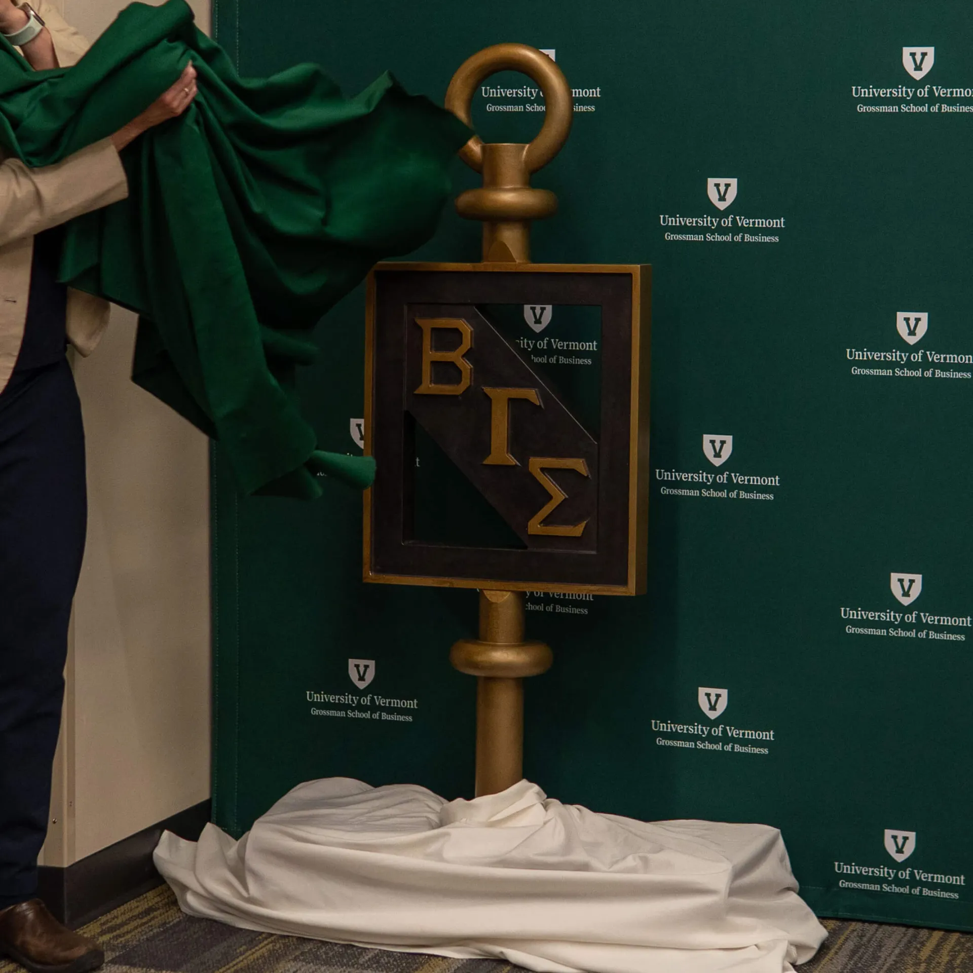 The Beta Gamma Sigma key made of bronze and standing about four feet high is unveiled