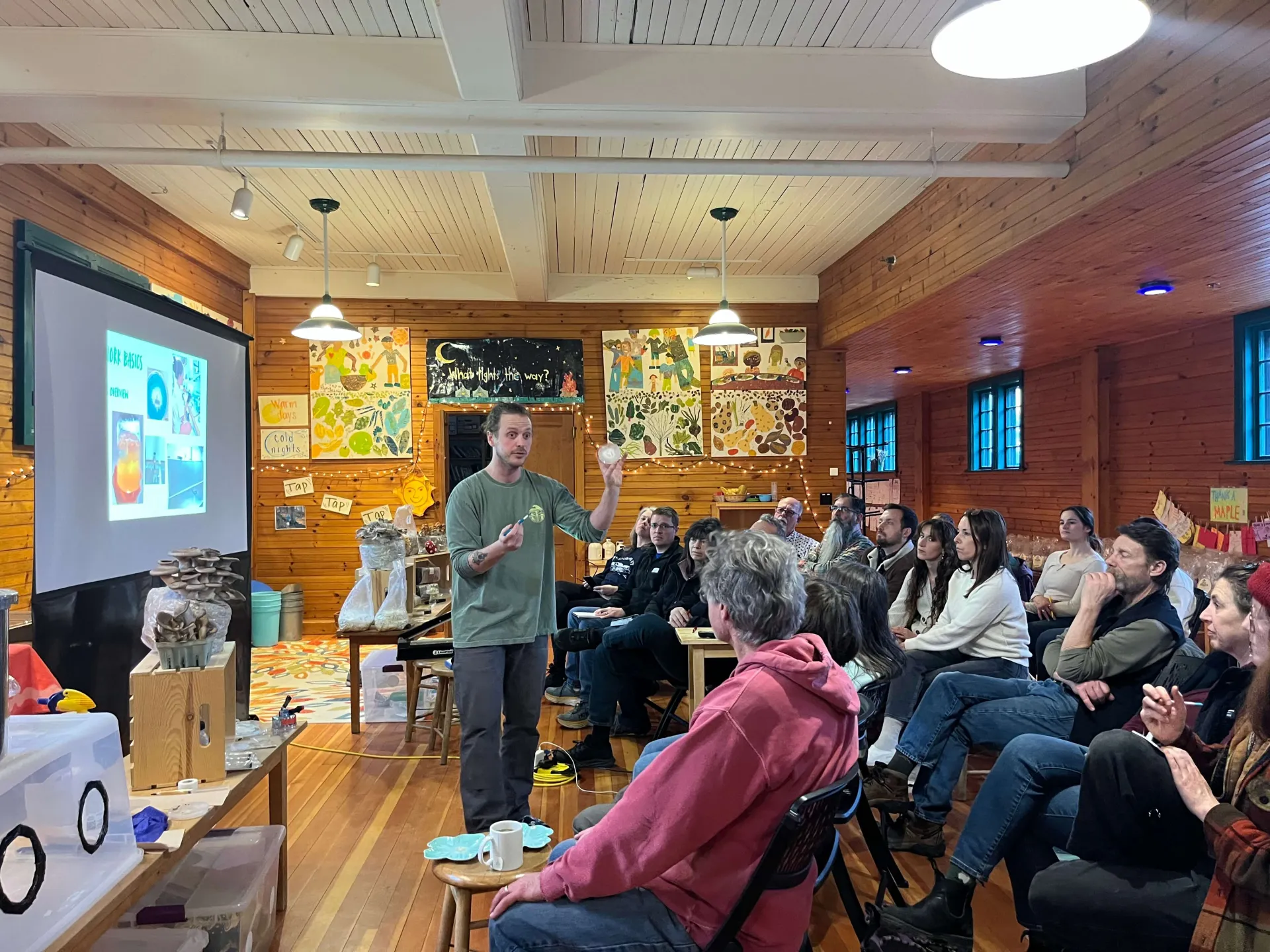 A man teaching a workshop about mushroom cultivation