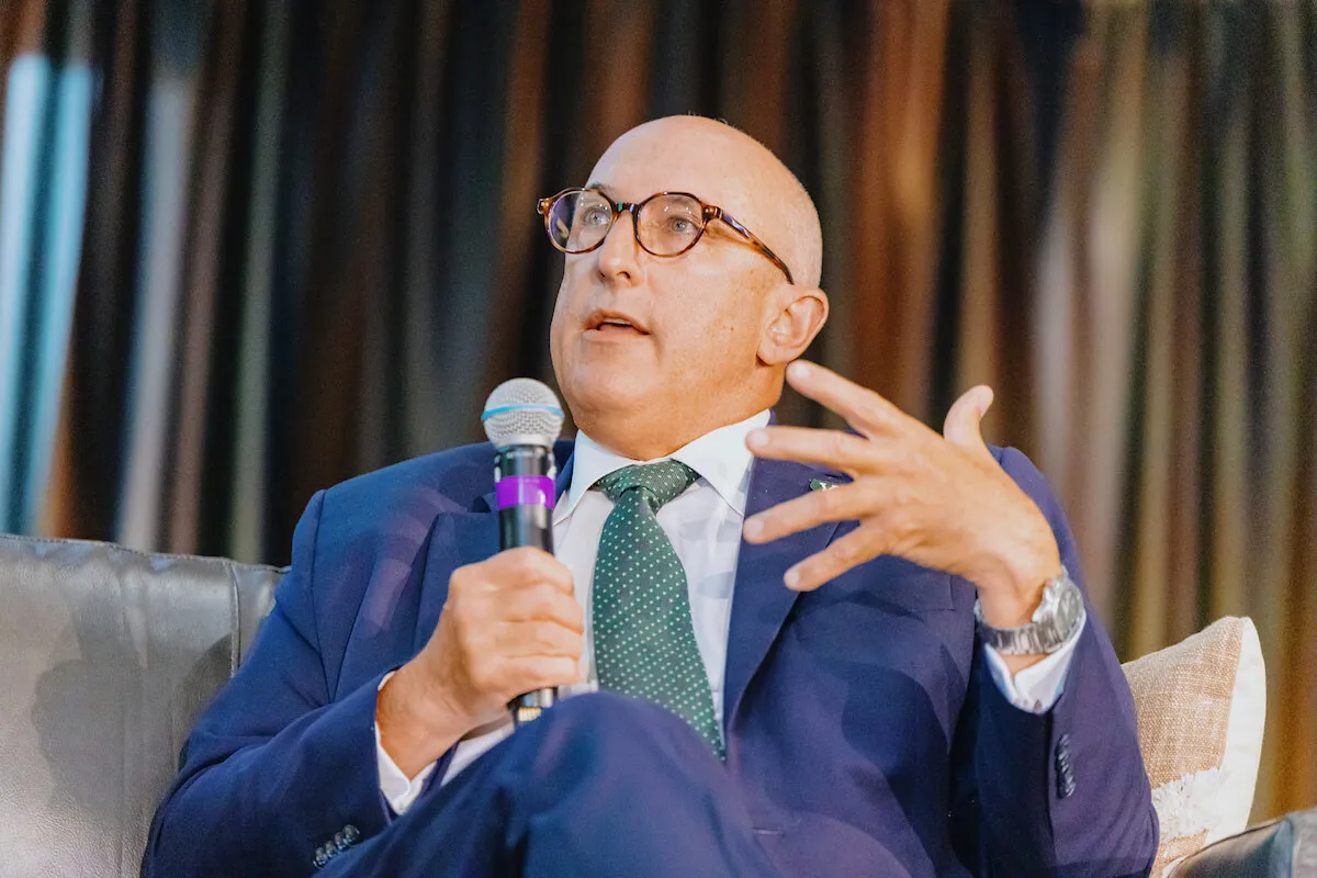 Kirk Dombrowski speaking at the 2025 RISE Summit 