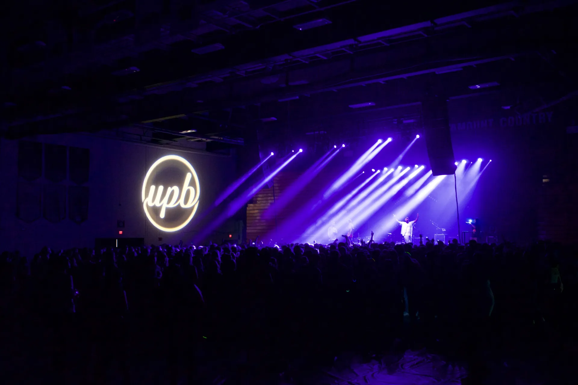 UPB Logo displayed on wall behind stage at FallFest