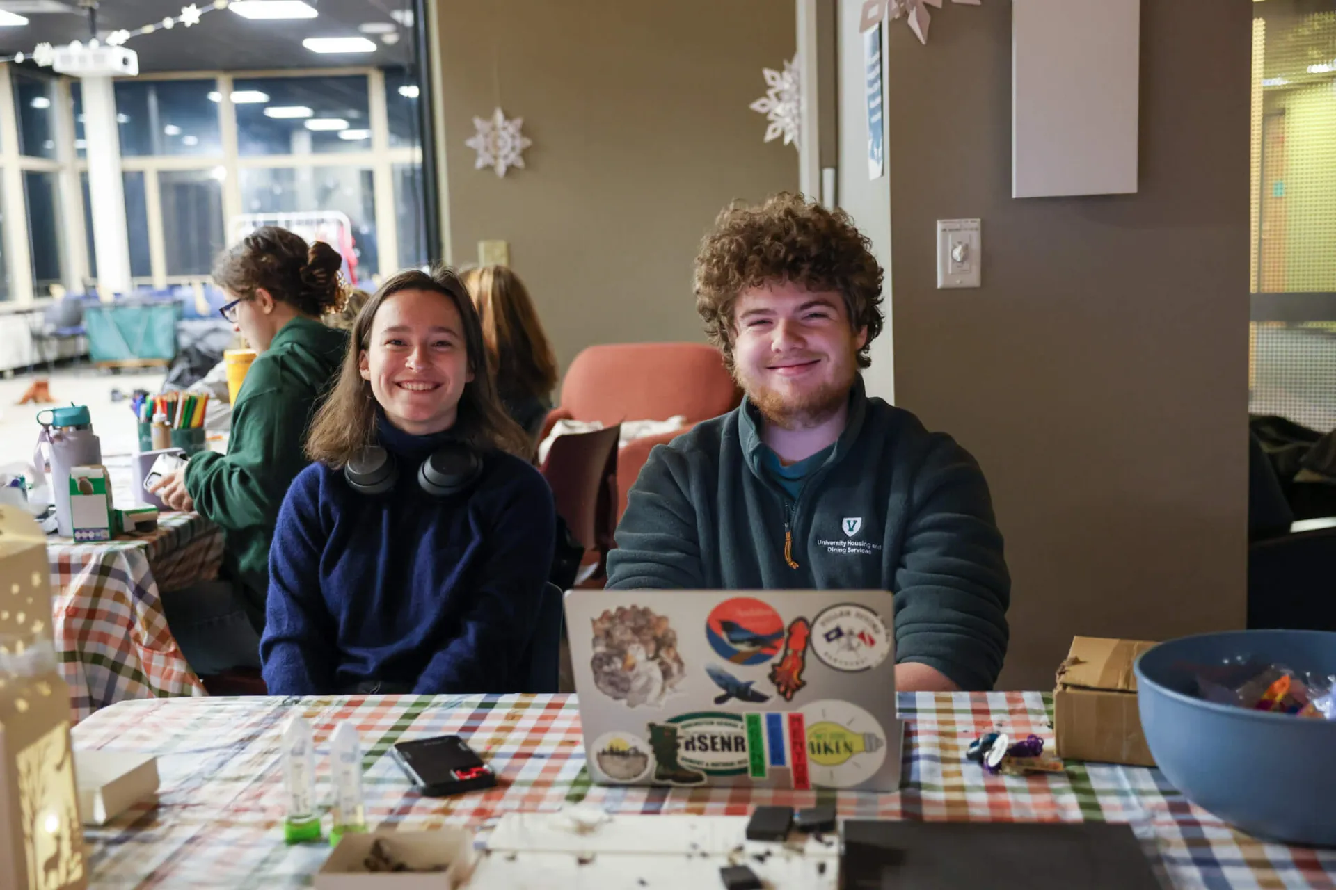 Two Students sit at a table