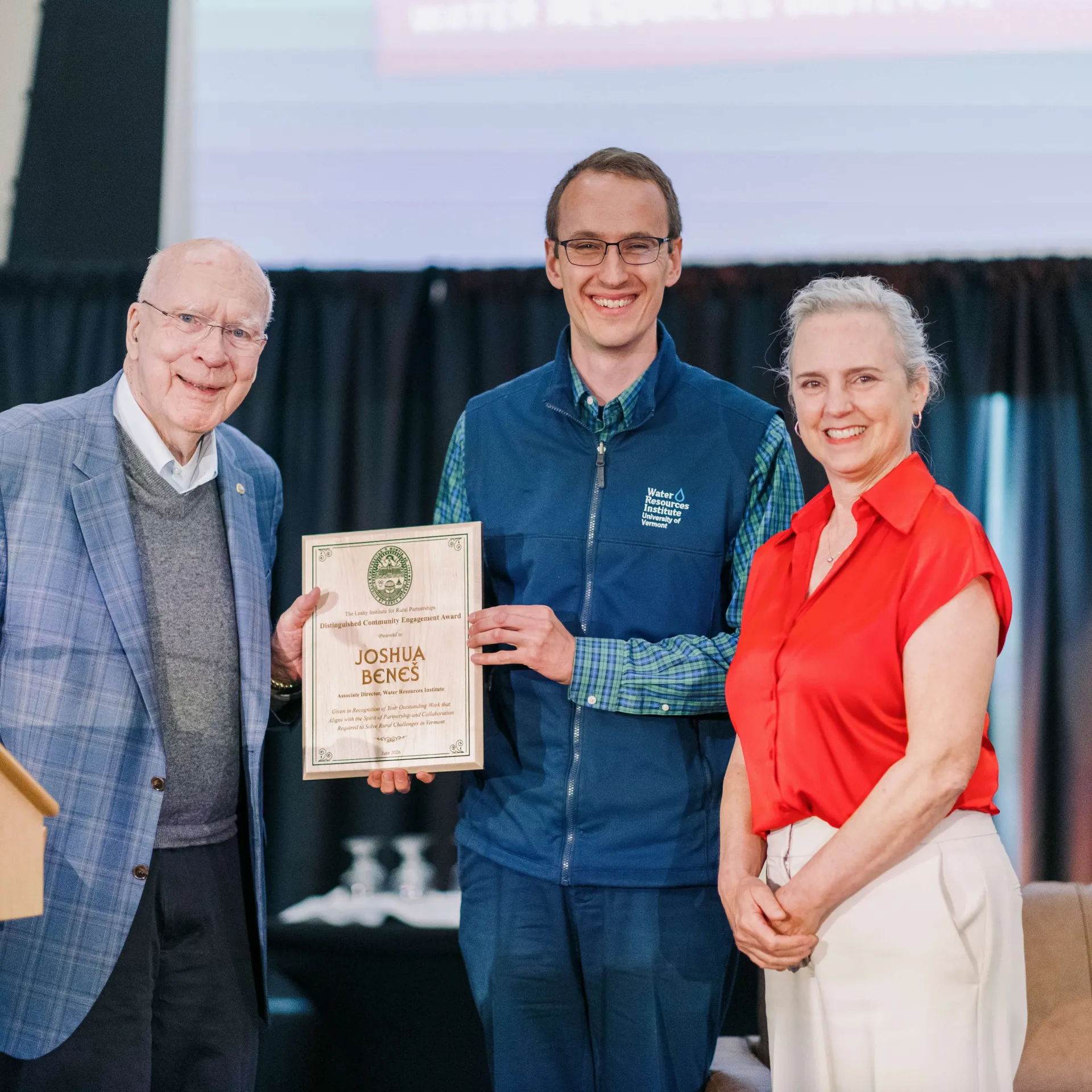 Joshua Beneš wins the 2026 Distinguished Community Engagement Award at the RISE Summit