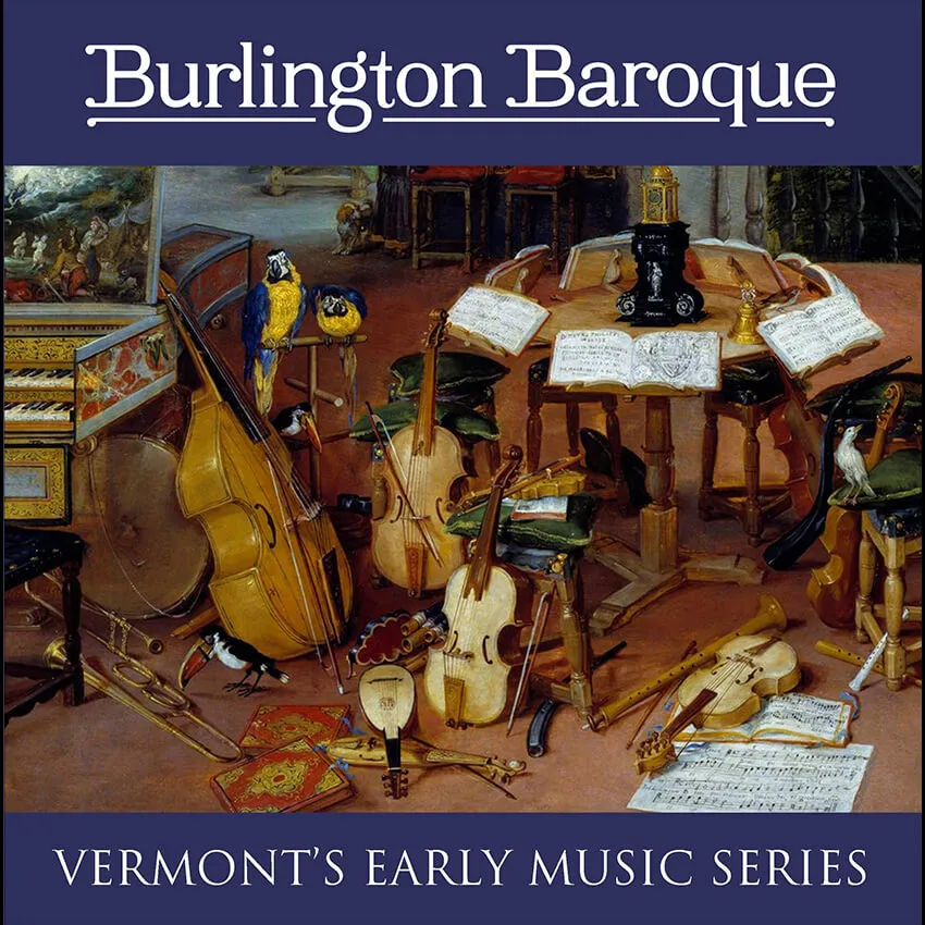 Early music instruments around a table with sheets of music on it