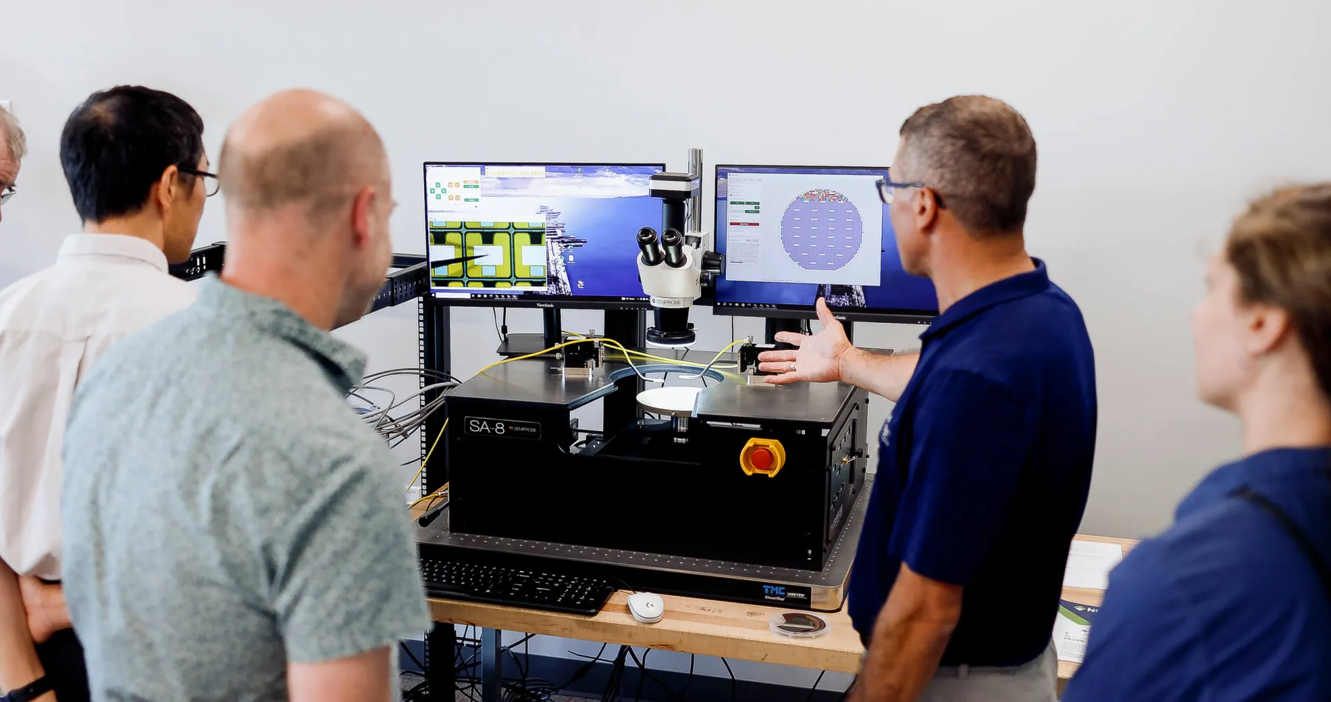 Engineers showcase a semiconductor probe station