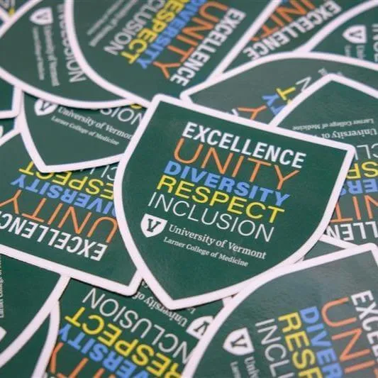 Stickers saying Excellence, unity, diversity, respect, inclusion