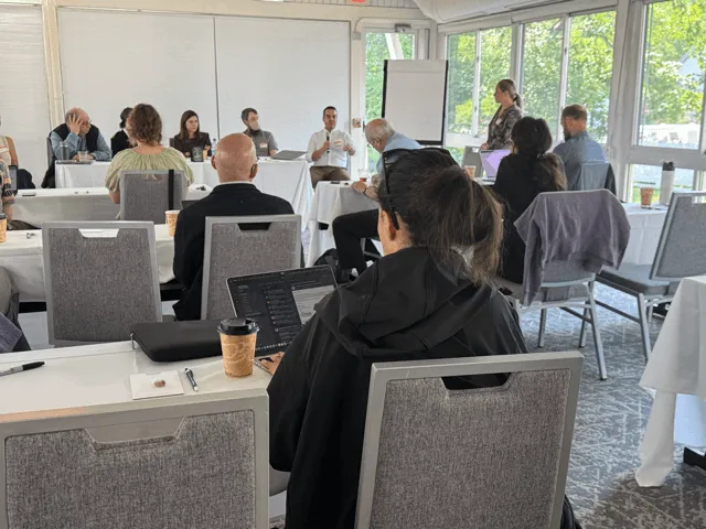A group of people at a conference