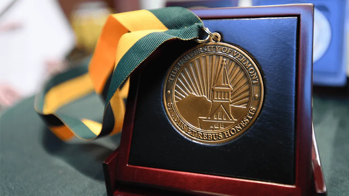 Close-up of the medallion presented to endowed professors and chairs at UVM.