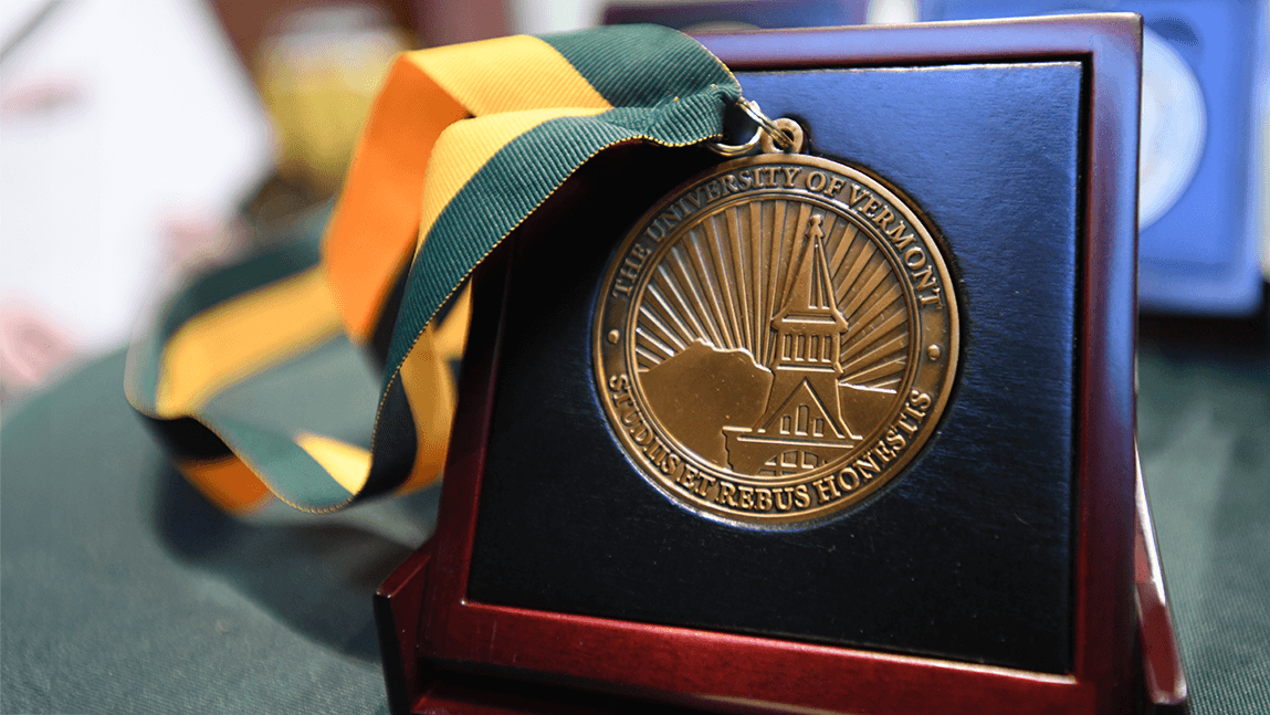 Close-up of the medallion presented to endowed professors and chairs at UVM.
