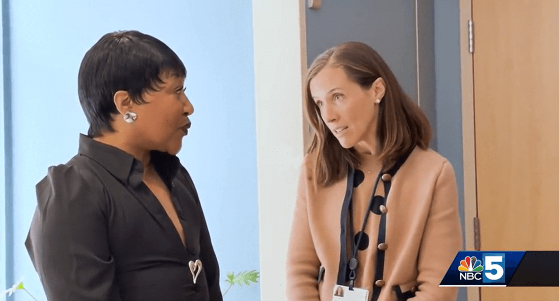 Breast cancer survivor Agnes Judge (left) speaking with clinical breast oncologist and cancer geneticist Kara Landry, M.D., assistant professor of medicine at the Larner College of Medicine