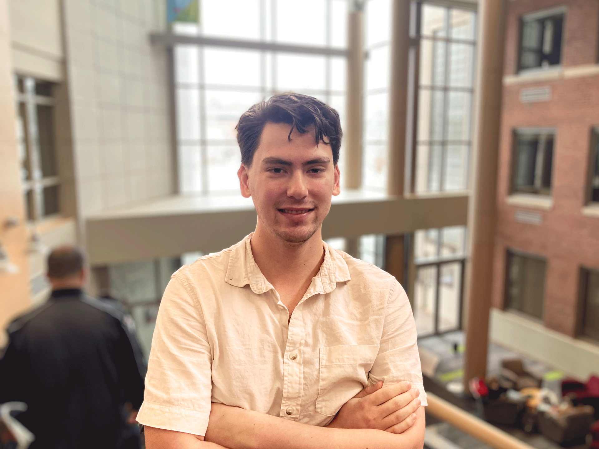 UVM Senior Ethan Peck stands on the second floor of the Dudley Davis Center