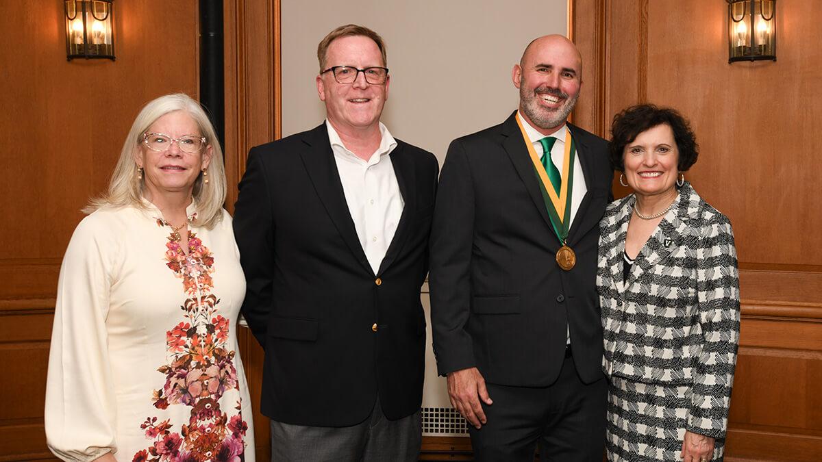 Mary and Karl Fessenden join Dr. Nic Fiorentino and President Patty Prelock for a photo