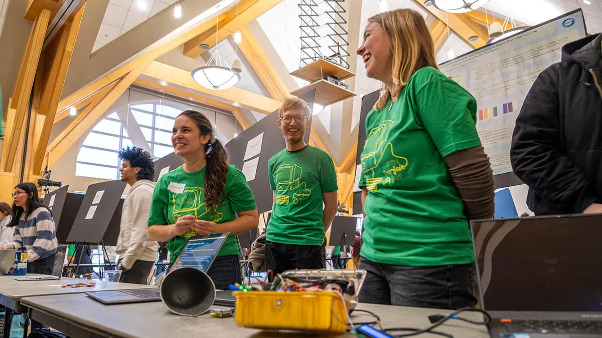 Student teams share their innovative projects during the 2024 Computer Science Fair in the Davis Center Grand Maple ballroom.