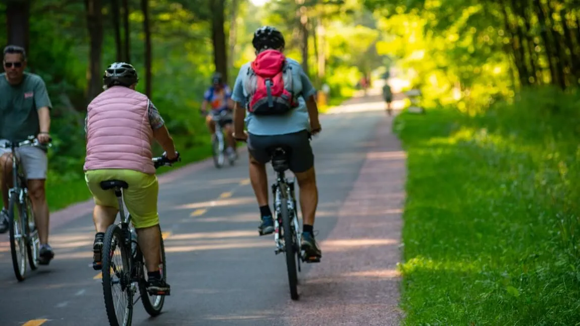 two people riding on burlington bike path