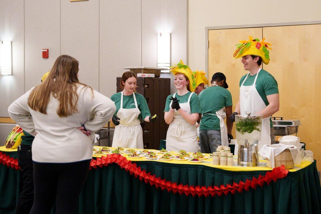 UVM students present their street tacos for sampling at the recent UVM Dining Catamount Culinary Showcase.