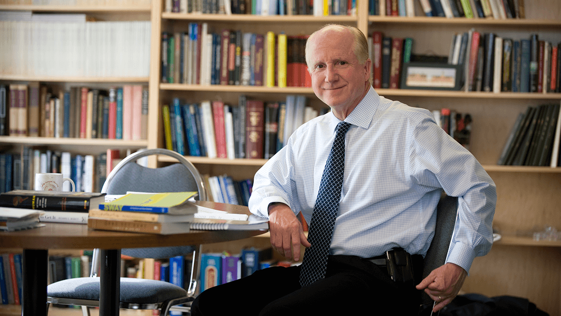 Dr. Higgins in his office