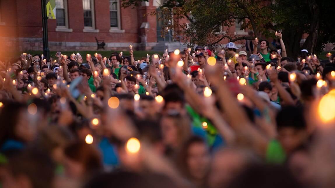twilight induction ceremony with lighted candles