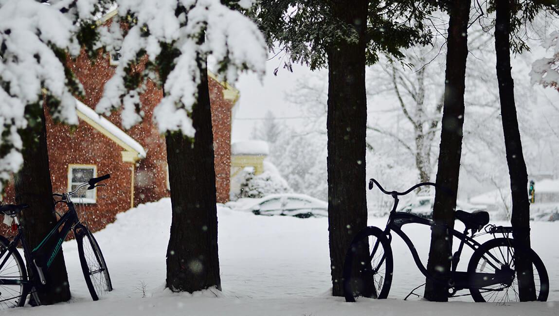 snowy scene with bicycles
