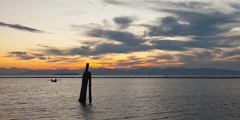 A boat on Lake Champlain at sunset