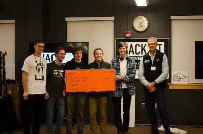 students receiving check for $500