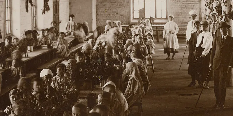 Starving children eat at a soup kitchen established by the American Relief Administration in the early 1920s.