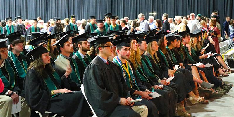 Graduates sitting at Commencement ceremony