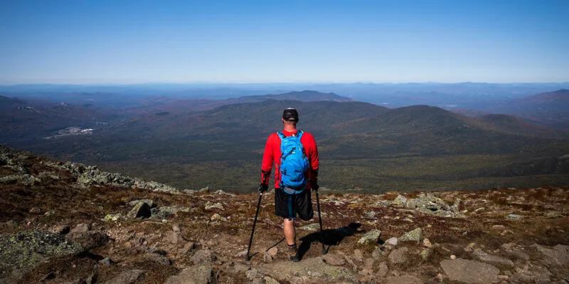 Dana Albrycht takes in the views on a hike in the White Mountains, New Hampshire.