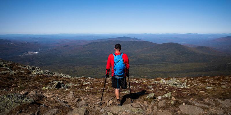 Dana Albrycht takes in the views on a hike in the White Mountains, New Hampshire.