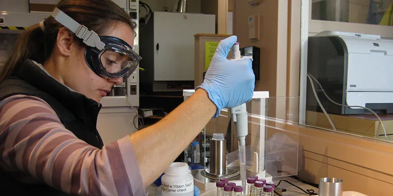 Geologist Lee Corbett works in a lab