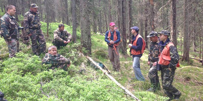 Bill Keeton training Ukrainian forest rangers in forest measurement 
