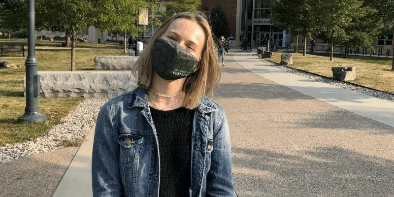 Student Lauren Rauert standing on UVM campus.