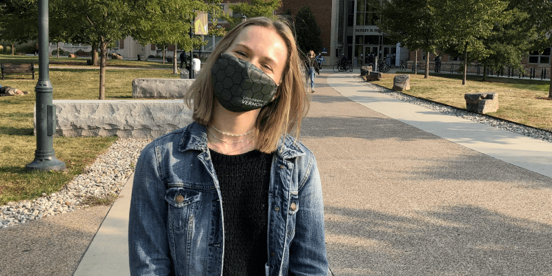 Student Lauren Rauert standing on UVM campus.