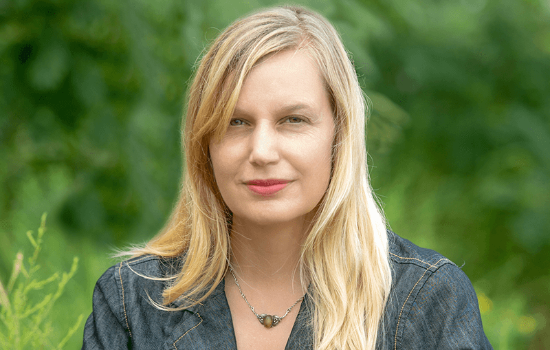 Maria Hummel headshot in an outdoor setting