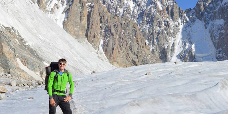 Nathan Fry stands on the Ak Sai Glacier in the Ala Archa National Park, Kyrgyzstan. Photo by Ben Teasdale (UVM ’15).