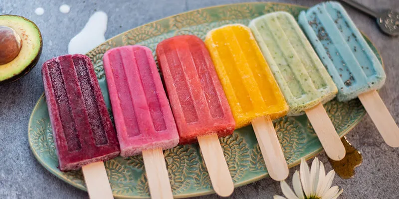 Assortment of popsicles on a platter.