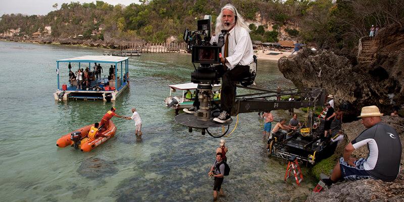 Cinematographer Robert Richardson mans camera on set over ocean