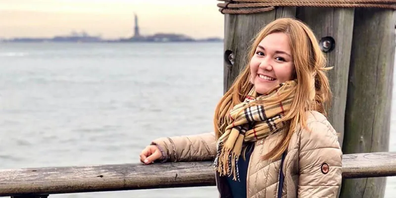 Rosaura Chapina at on a lake pier