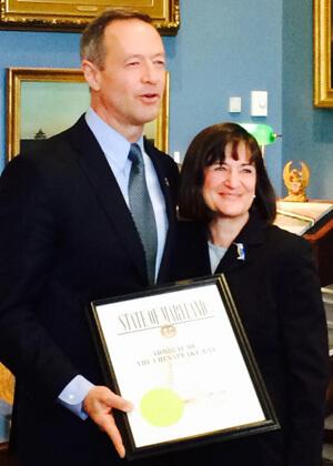 Ann Swanson receives Admiral of the Chesapeake Award from Governor Martin O'Malley of Maryland in January 2015.