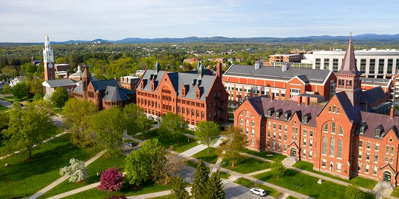 aerial view of University row, Williams Hall, Old mill, Ira Allen Chapel, and Discovery building and hospital behind