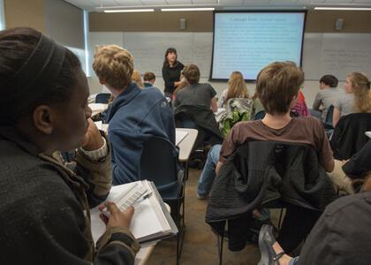 classroom with students using i-clickers
