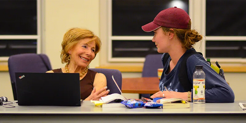 Gail Sheehy '58 with student
