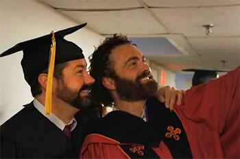 Taking a selfie at the December Hooding Ceremony
