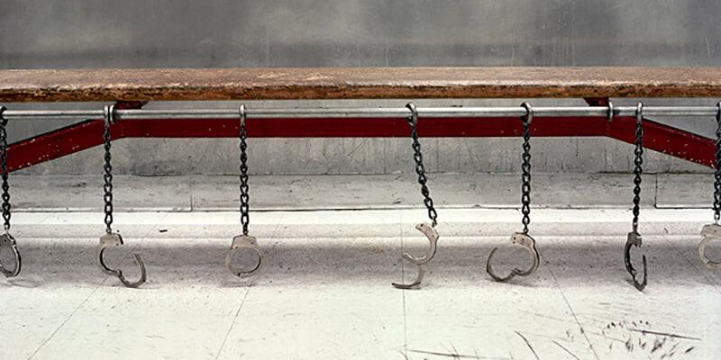 Handcuffs on a bench