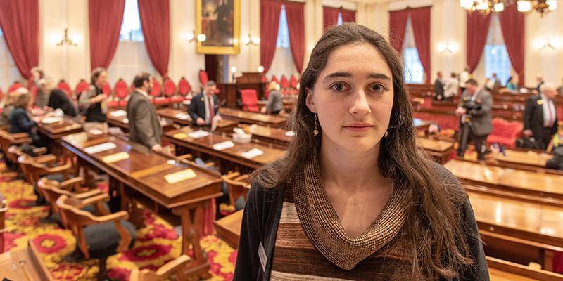 Lucy Rogers with Vermont State House floor in background.