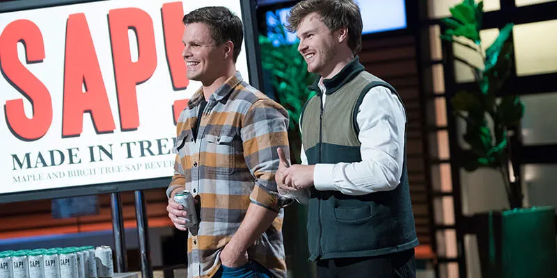 Nikita Salmon and Chas Smith on set of Shark Tank