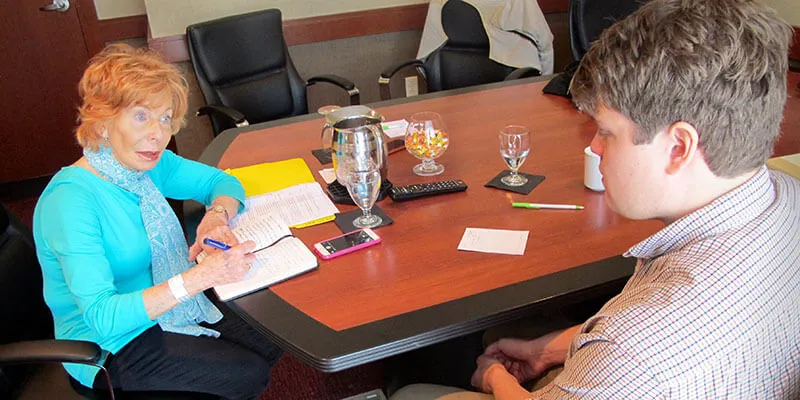 Gail Sheehy interviewing student  Finn Galloway