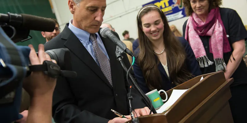 signing of Vermont's new motto